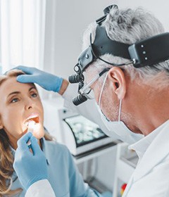 Woman undergoing exam of her upper airway